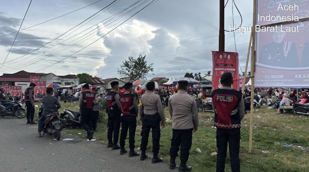 Polres Lhokseumawe Kerahkan Personil Amankan Kampanye Paslon Pilkada Nomor urut 2 di Hagu Barat Laut