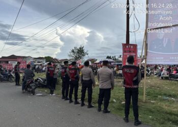 Polres Lhokseumawe Kerahkan Personil Amankan Kampanye Paslon Pilkada Nomor urut 2 di Hagu Barat Laut