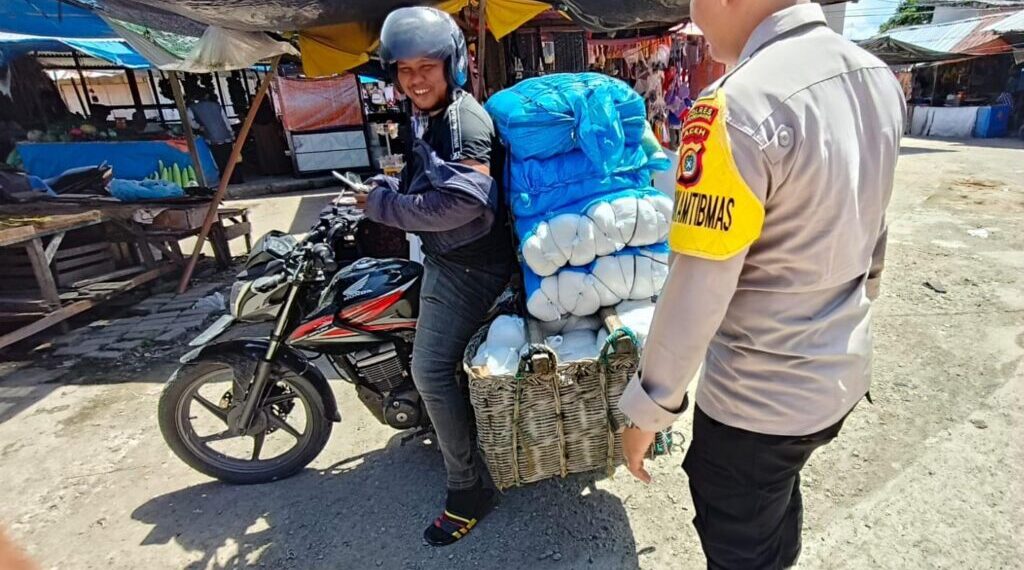 Personel Polsek Samudera Lakukan Patroli Dialogis di Pasar Tradisional