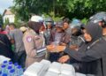 Satlantas Polres Lhokseumawe Laksanakan Jumat Barokah, Bagikan Nasi Kotak dan Edukasi Tertib Lalu Lintas