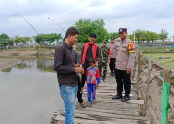 *Patroli Gabungan Polsek Muara Satu dan Koramil 01/Ms dalam rangka Antisipasi Gangguan Kamtibmas Jelang Nataru 2024*